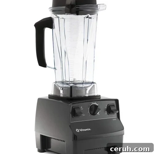 A black Vitamix blender with a clear plastic pitcher