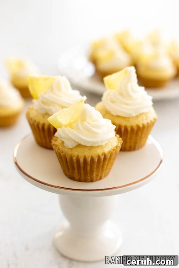 mini lemon cupcakes on pedestal