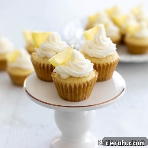 mini lemon cupcakes on pedestal