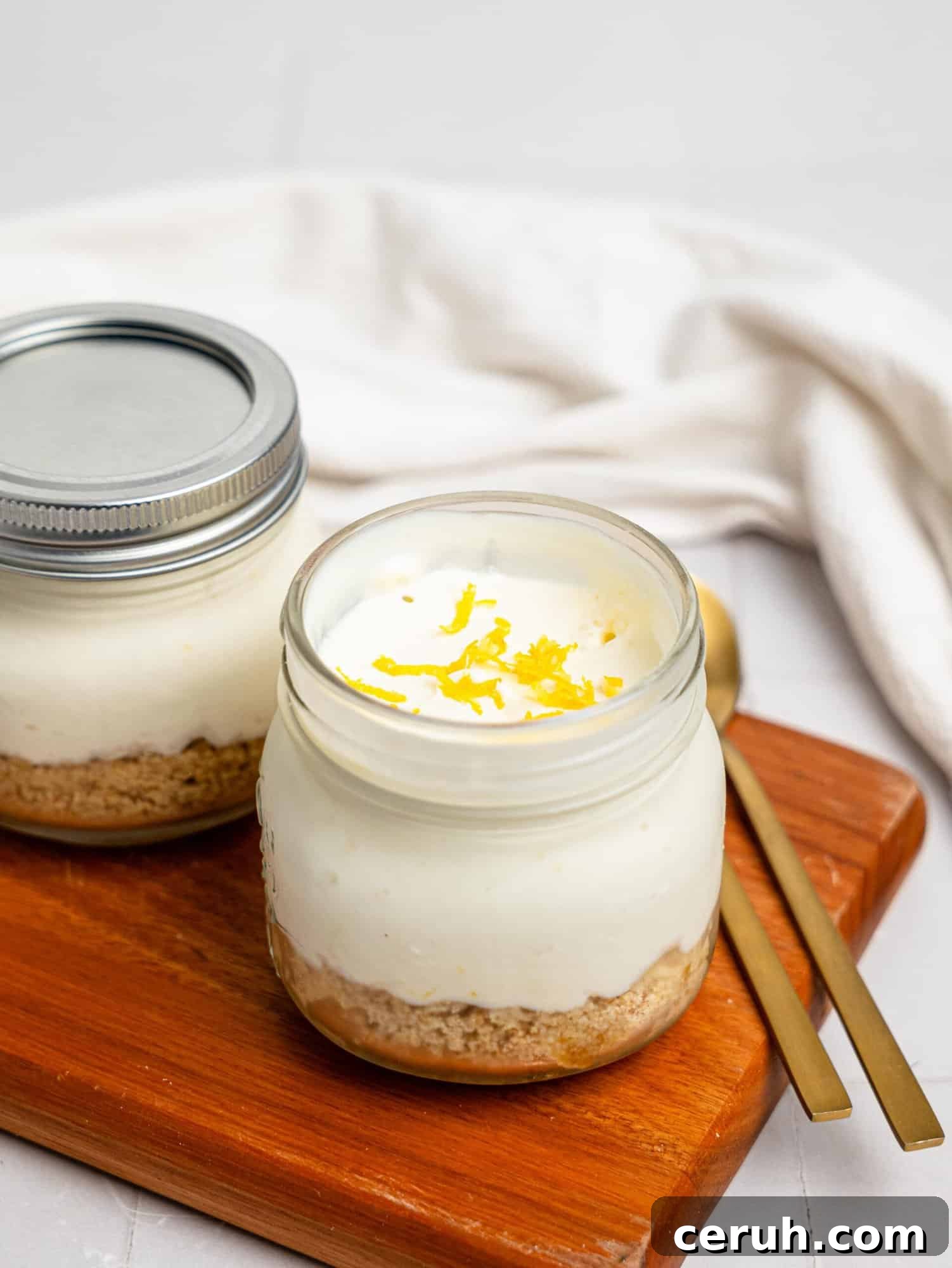 Two lemon cheesecake pots.