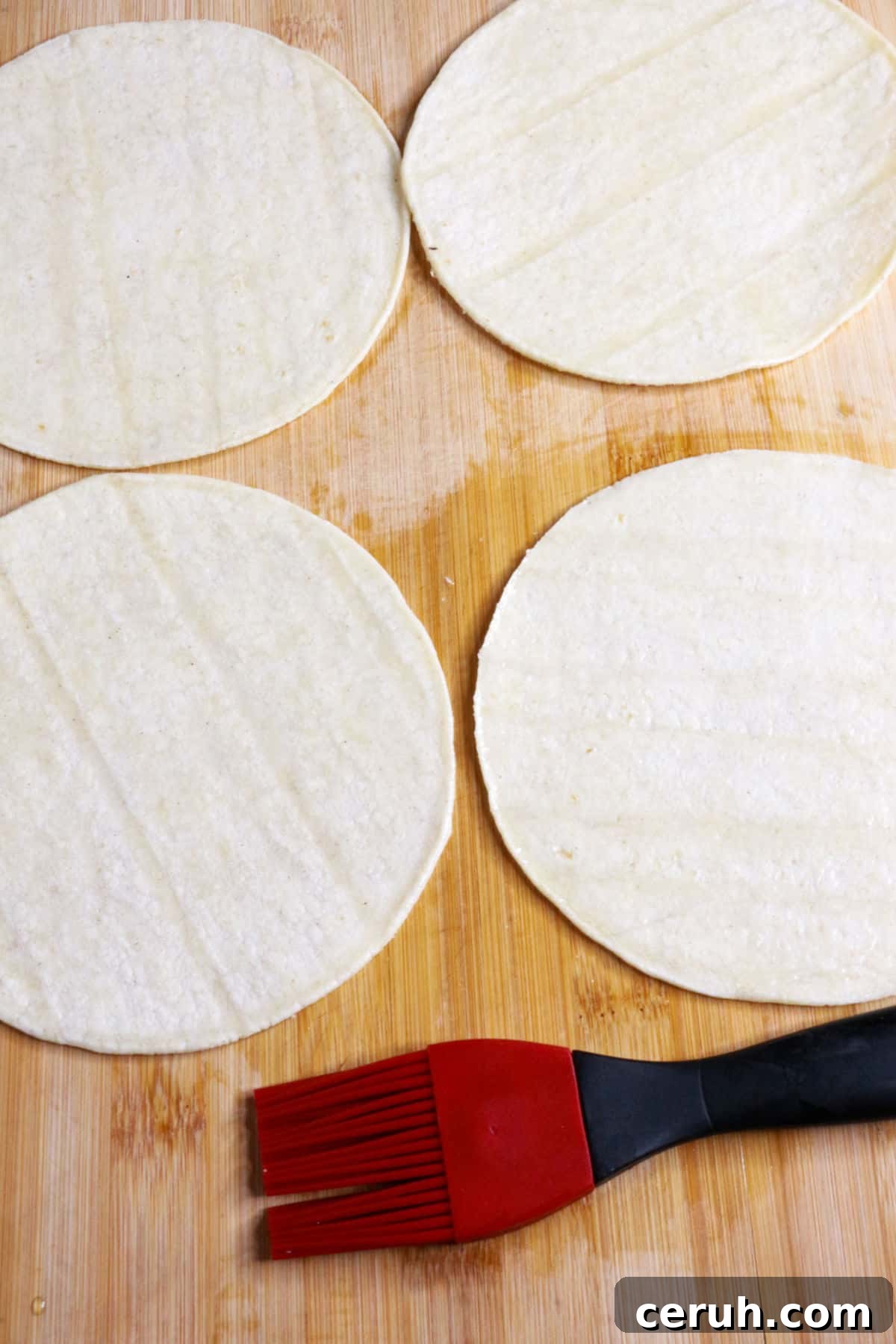 Homemade Tostada Shells: Crispy Tortilla Shell Recipe 7 Four corn tortillas and a pastry brush