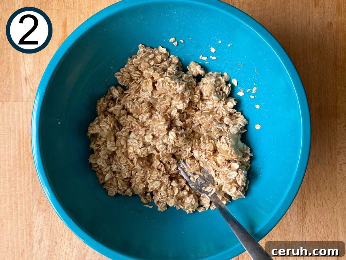 Old fashion rolled oats mixed into the mashed banana.