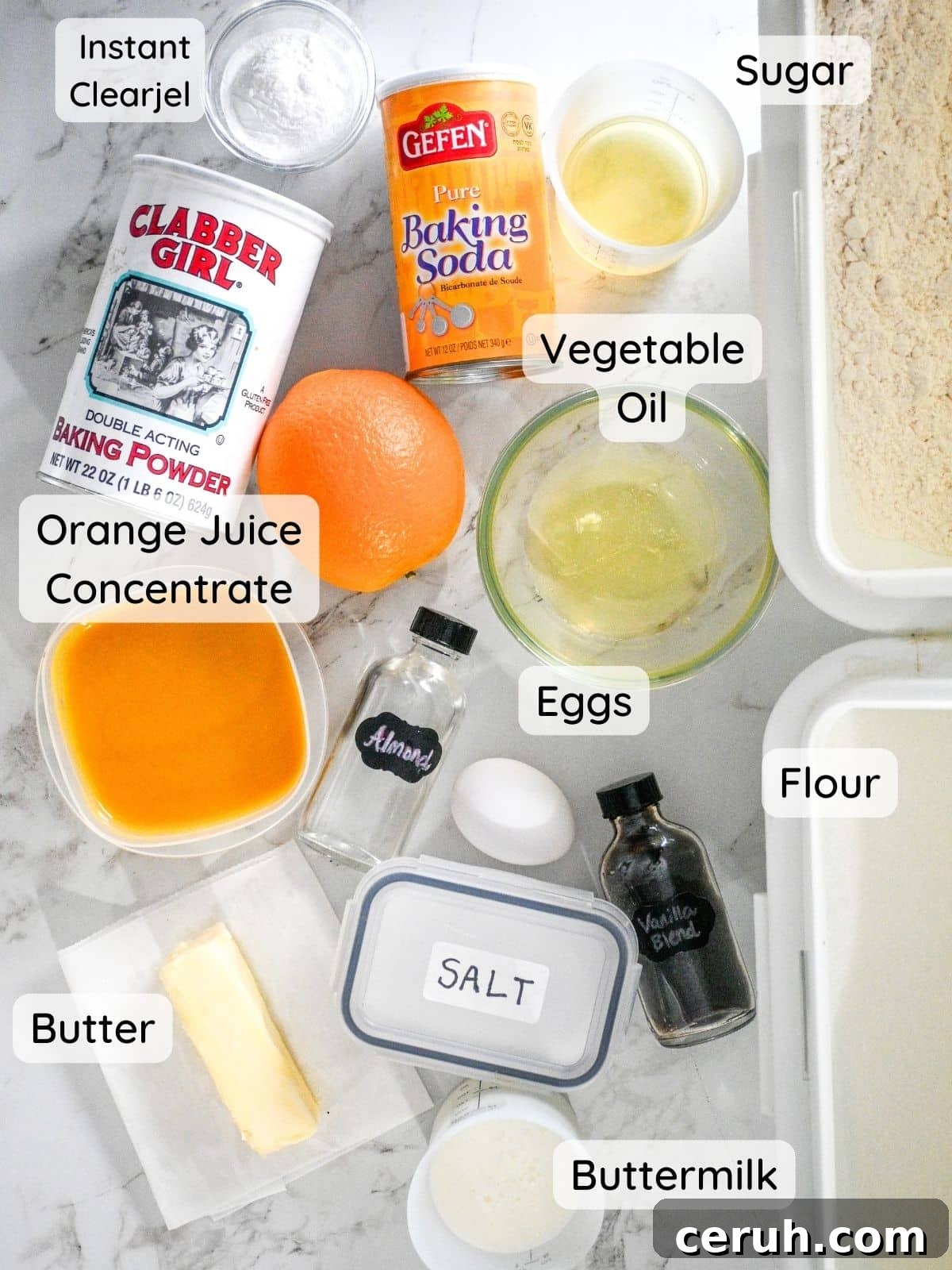 An overhead shot of the orange almond cake ingredients on a table.
