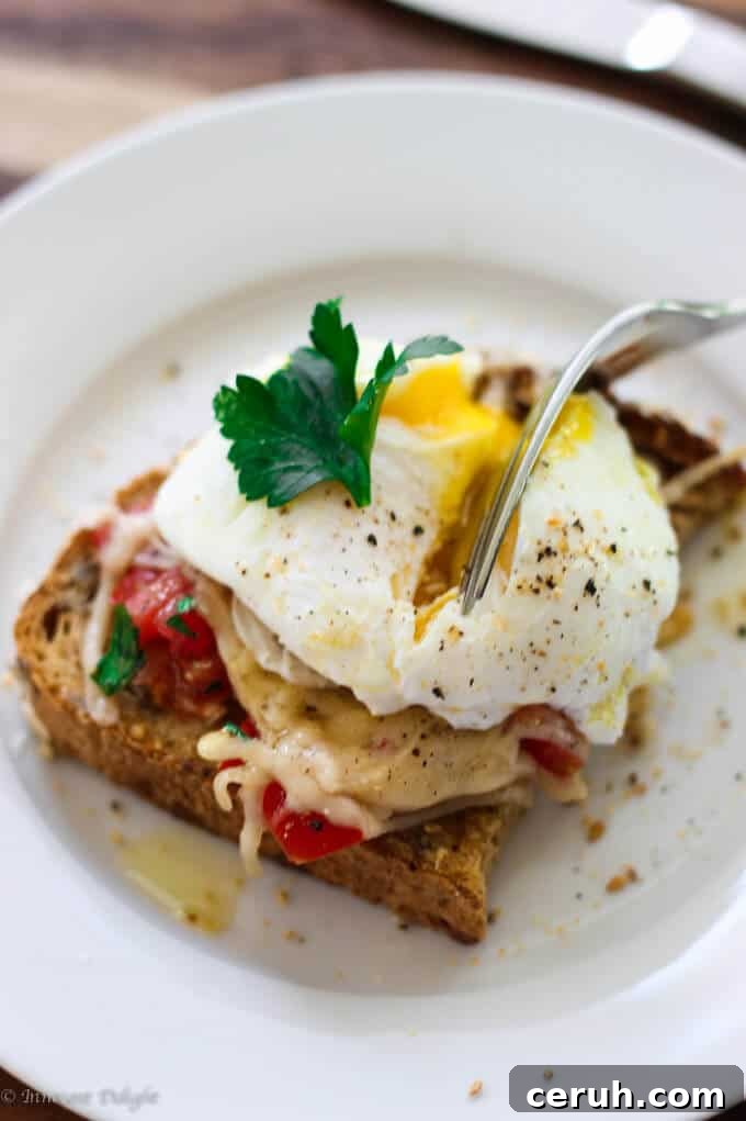 Poached egg on parmesan tomato toast