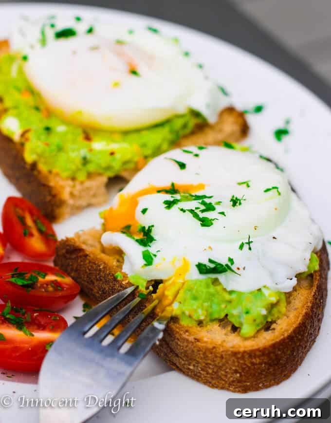 Smashed avocado with poached egg toast close up
