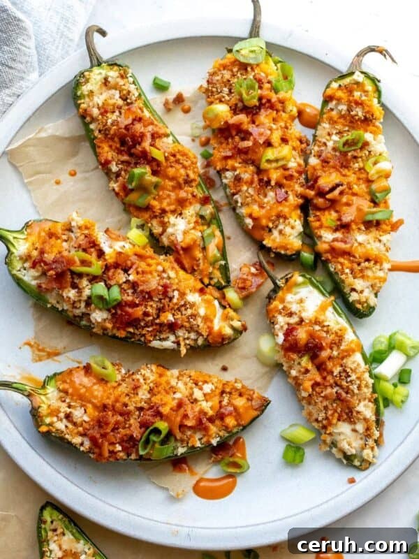 Oven Baked Jalapeño Poppers on a plate up close, overhead shot.