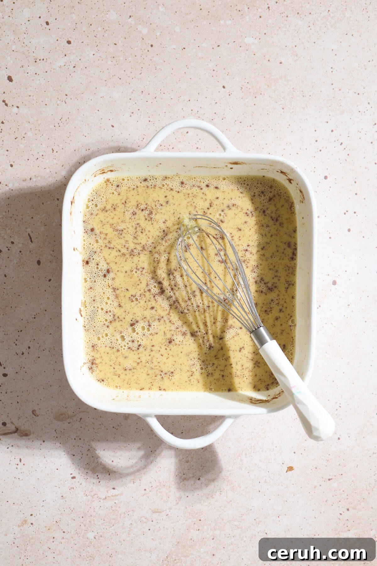 Egg mixture in a small casserole dish.