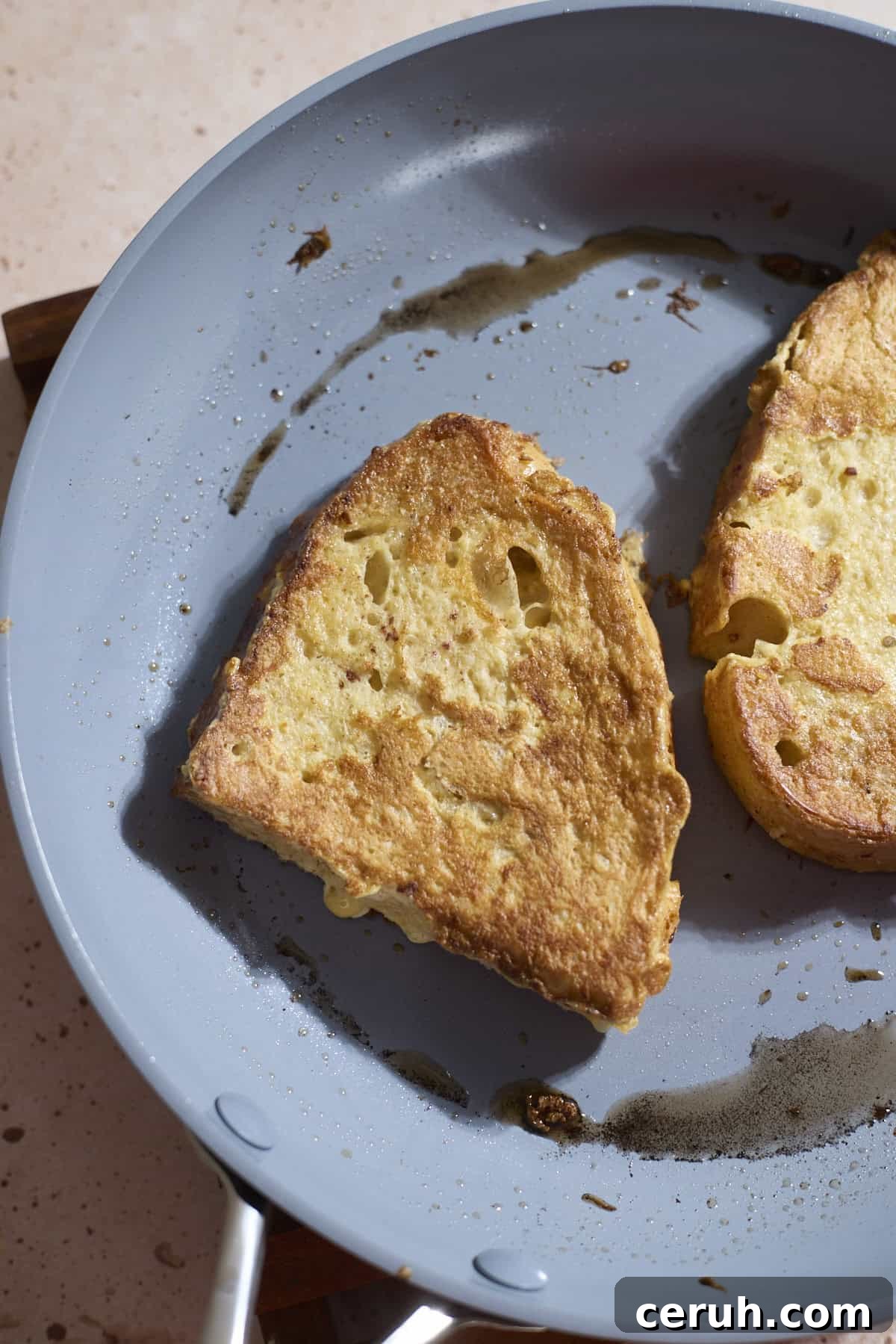 French toast cooking in a small skillet.