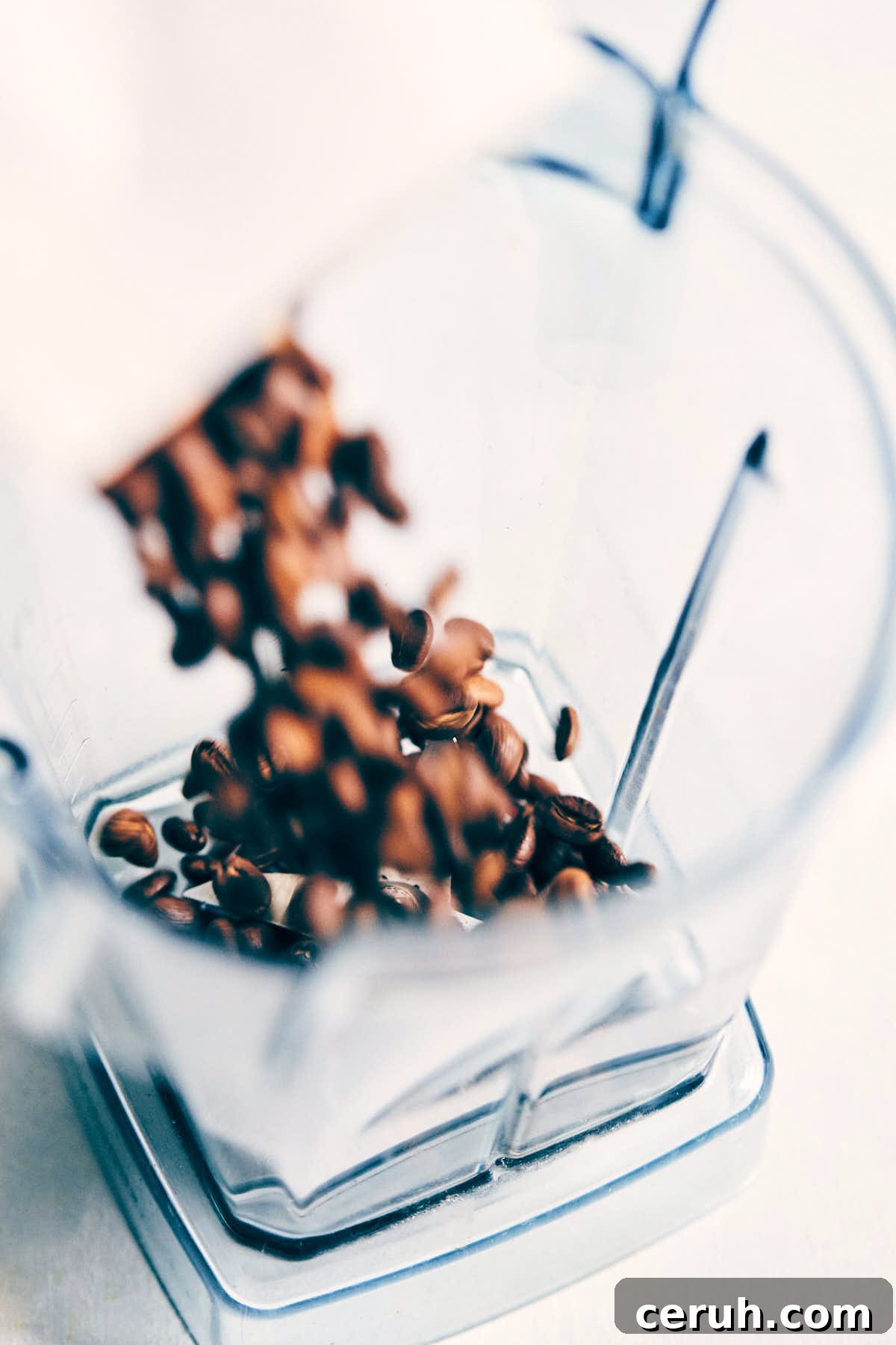 Coffee being poured into a blender