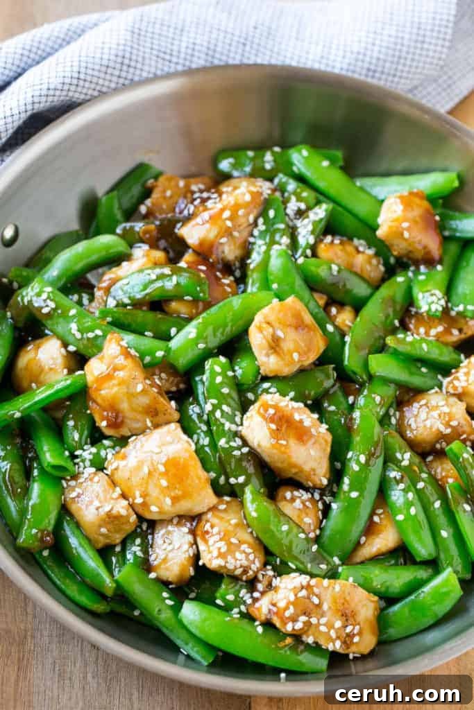 sesame chicken bites made with veggies in a frying pan