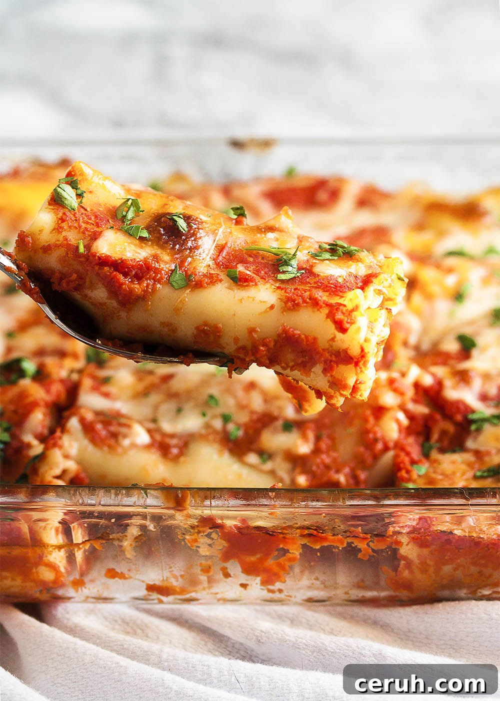 Easy Spinach Manicotti - rolled noodles ready for baking