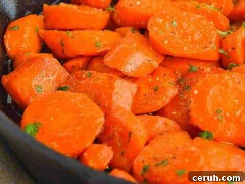 Glazed carrots in cast iron pan