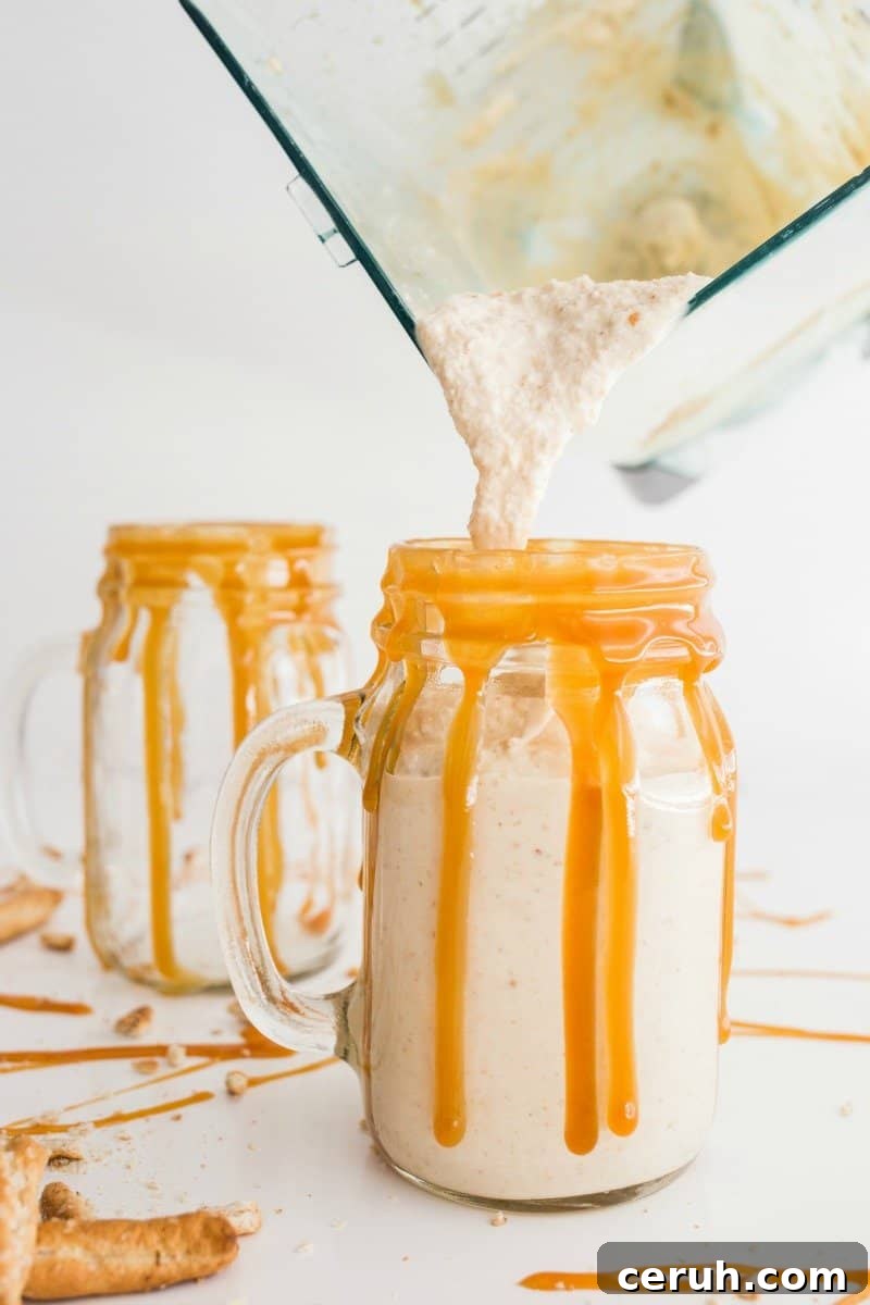 Milkshake with whipped cream and pretzel bits